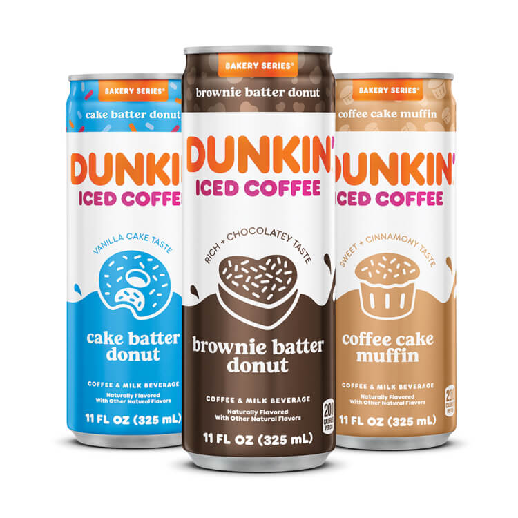 three cans of dunkin coffee